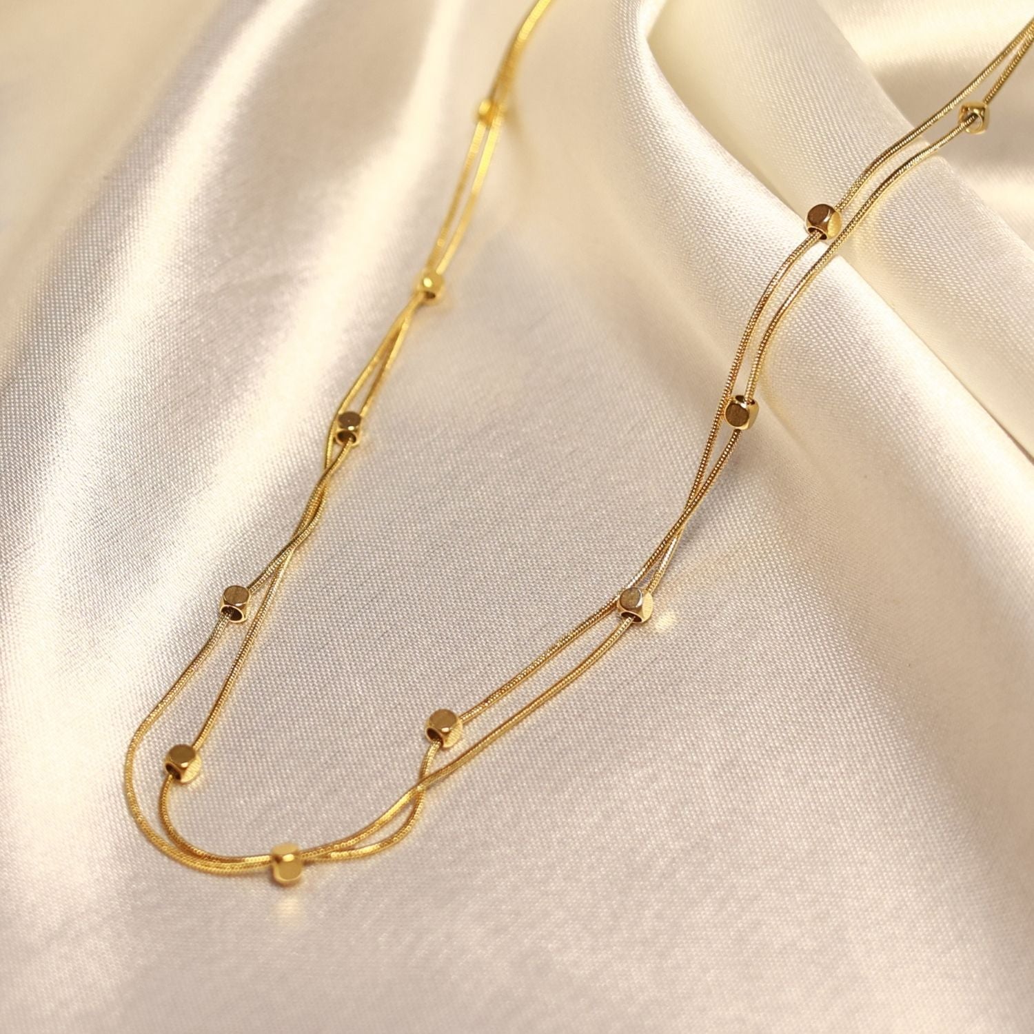 Golden droplets double layered chain